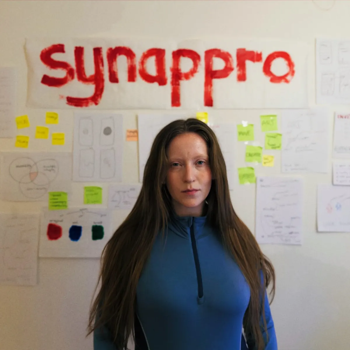 Jenny Halseid in front of early synappro planning notes